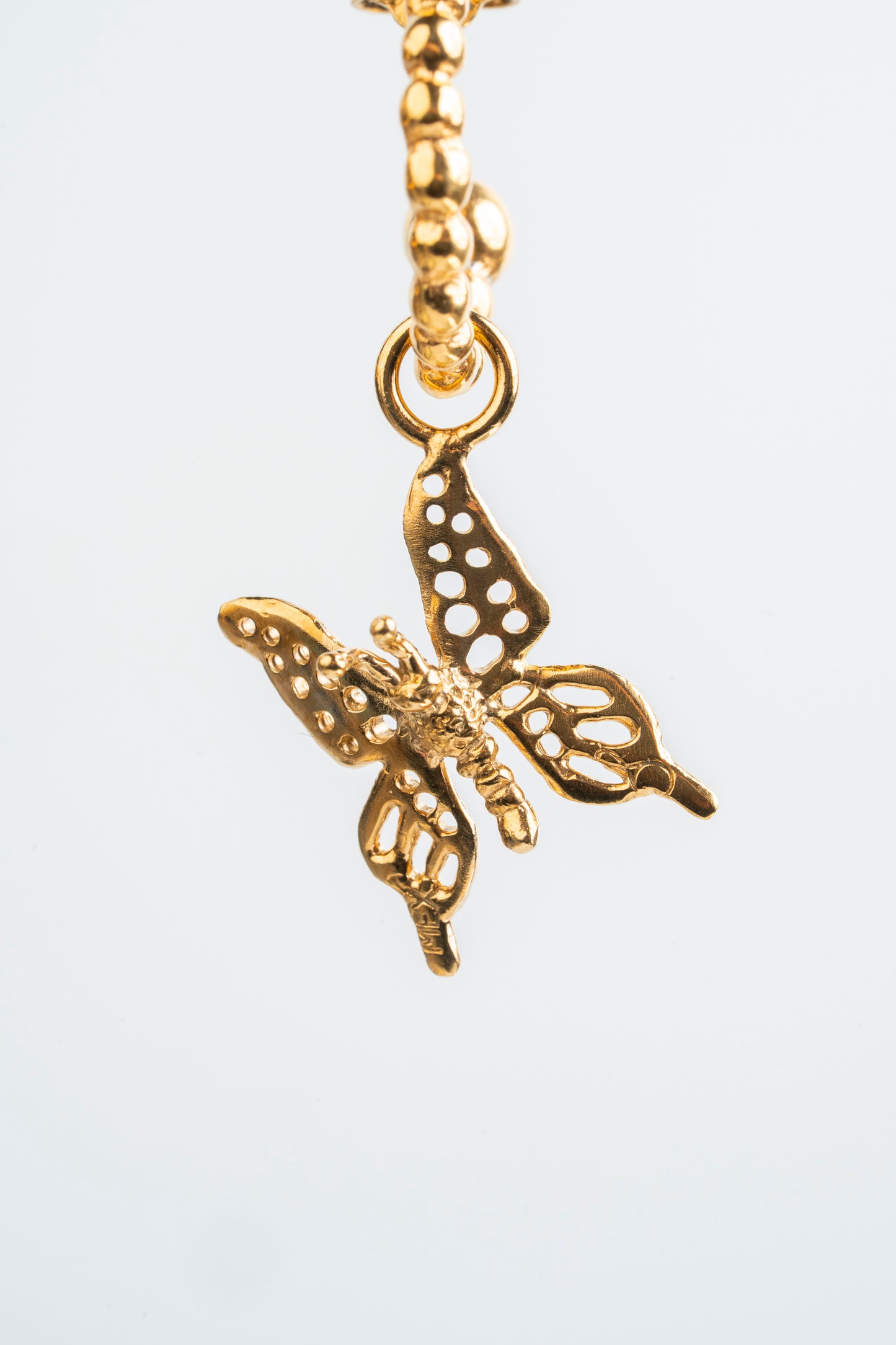 Butterfly: The golden flight of transformation.