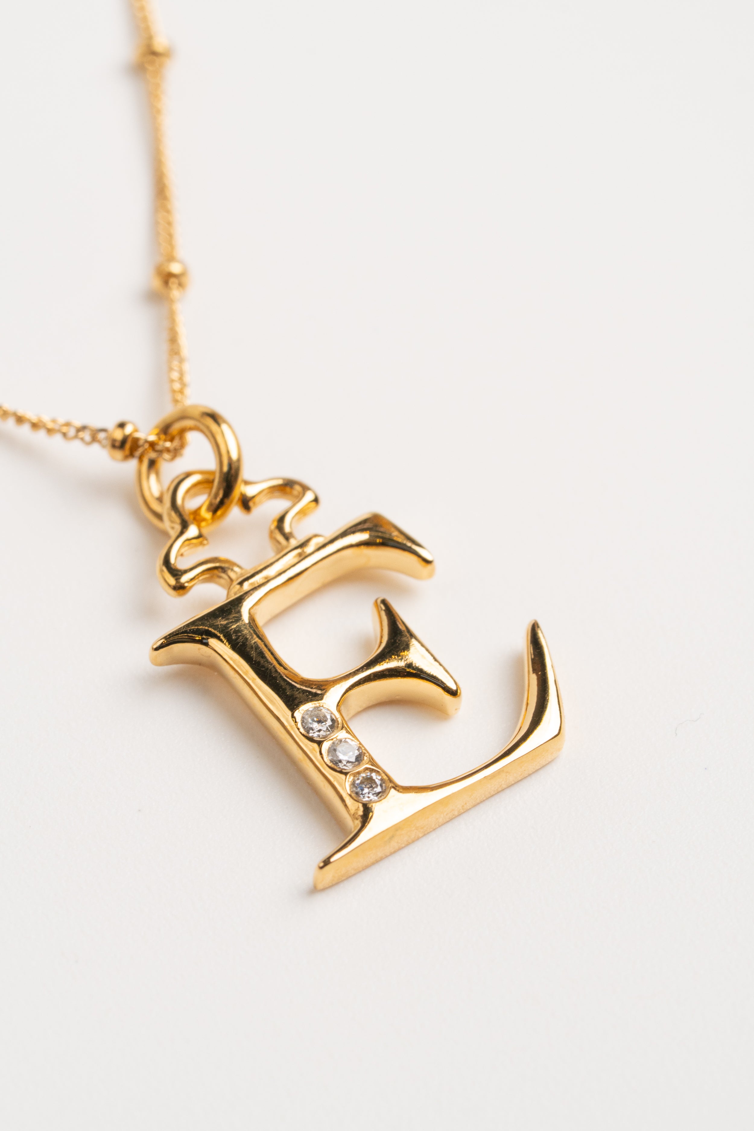 INICIALES ORO
