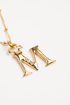 INICIALES ORO