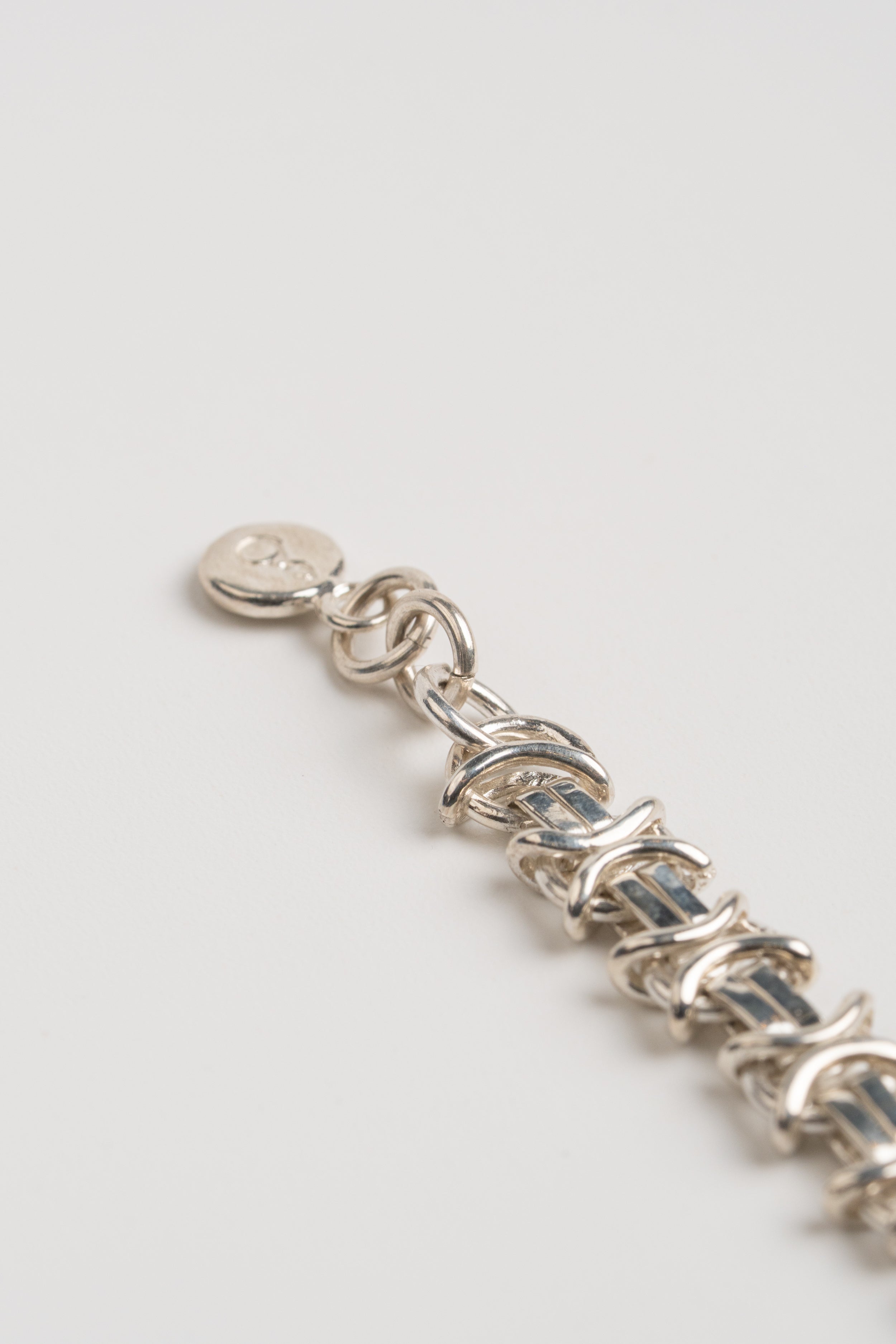 PULSERA JAPÓN PLATA: Símbolo de disciplina