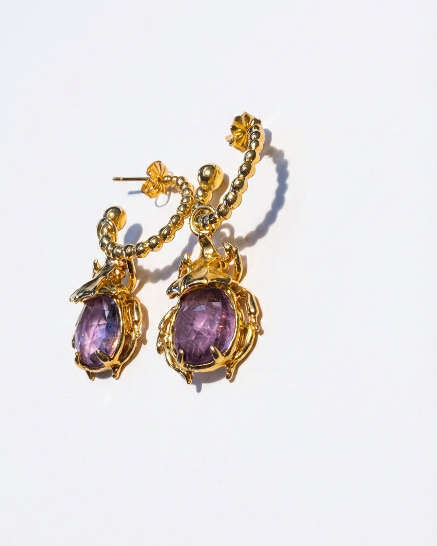 ARETES ESCARABAJO JIRAFA: Símbolo de elevación